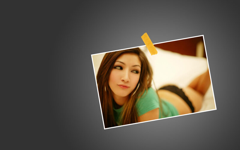 woman in green shirt lying down