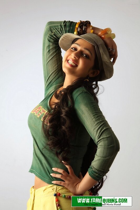 Woman in Green Shirt — Playful, Photograph, Hat