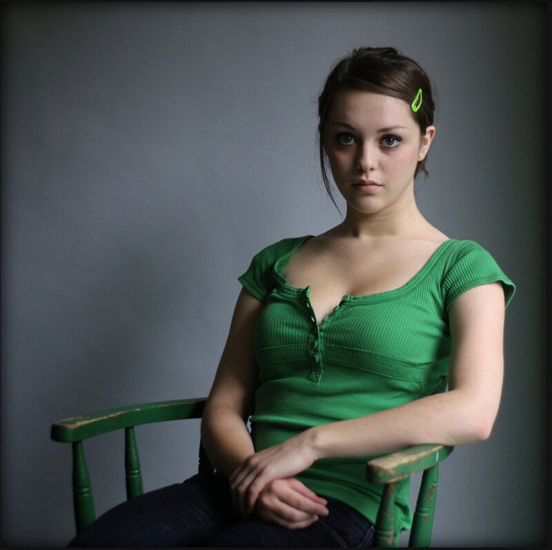 Woman in Green Shirt — Serious, Photograph