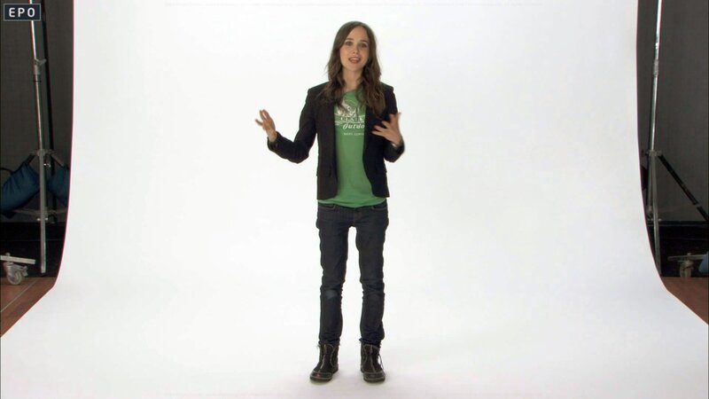 woman in green shirt speaking