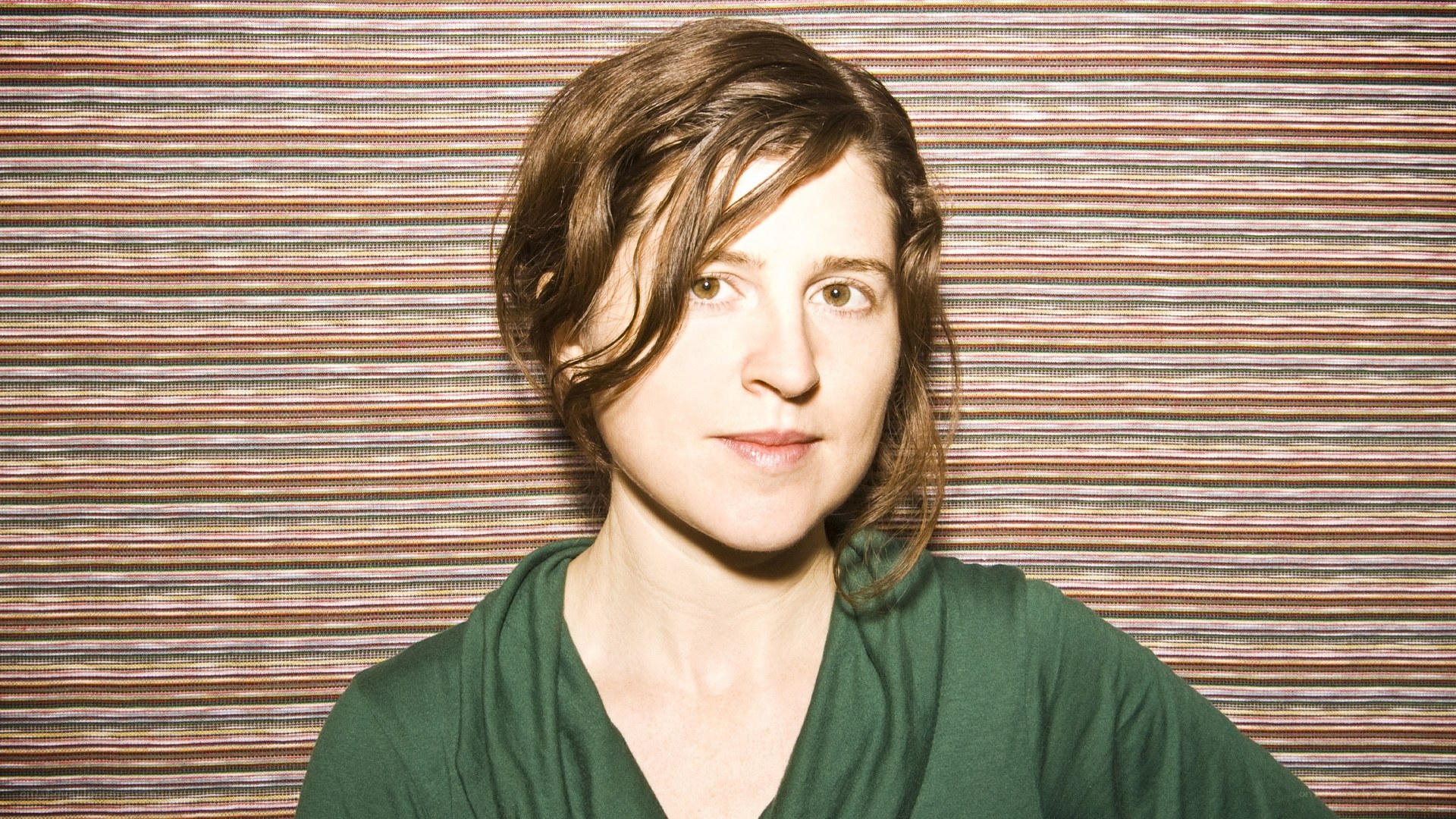 woman in green shirt