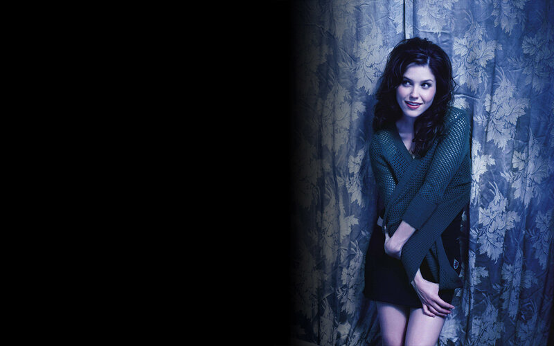 woman in green sweater