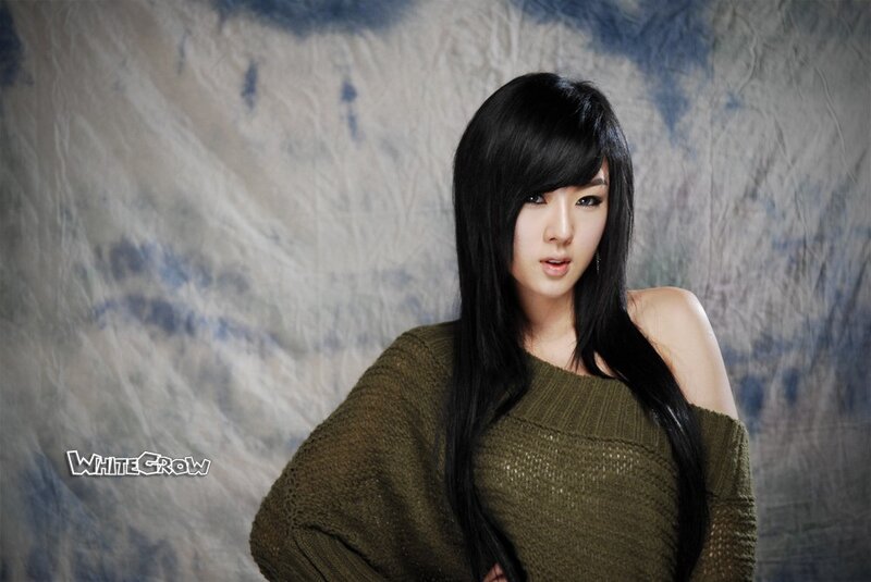 woman in green sweater