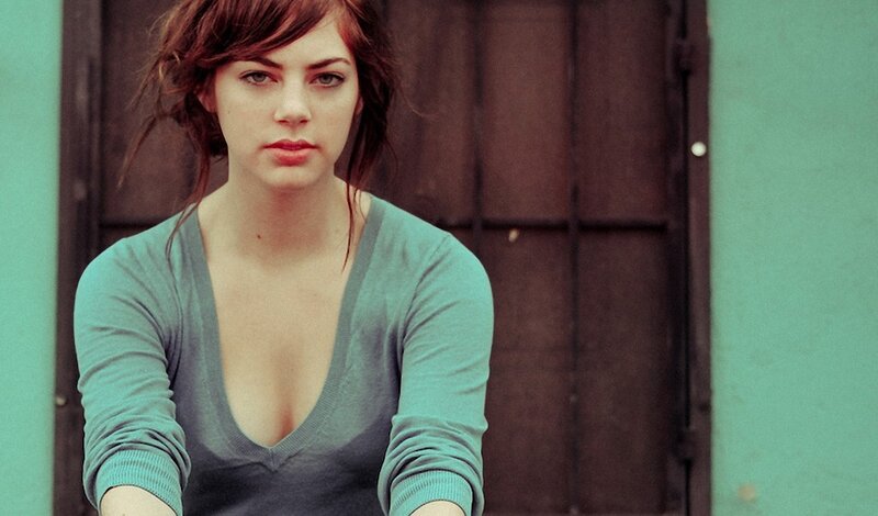 woman in green sweater