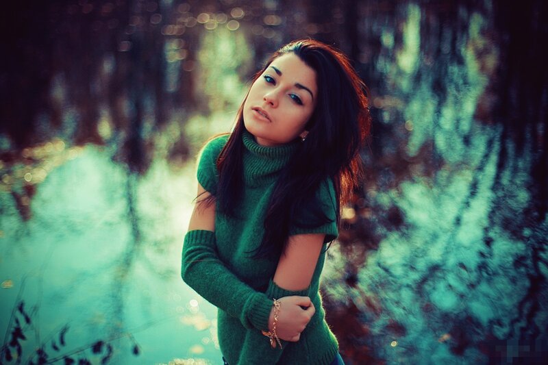 woman in green sweater