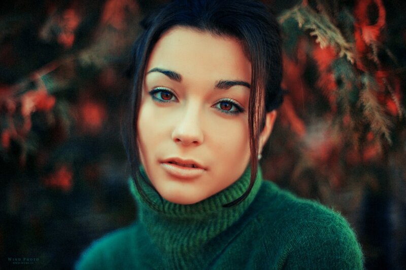 woman in green sweater
