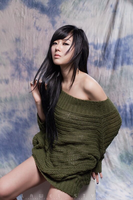 woman in green sweater