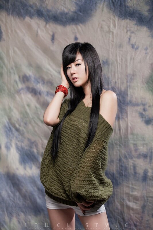 woman in green sweater