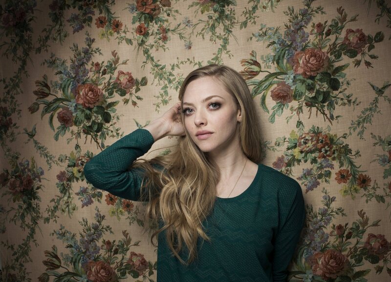 woman in green sweater
