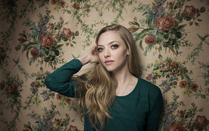 woman in green sweater