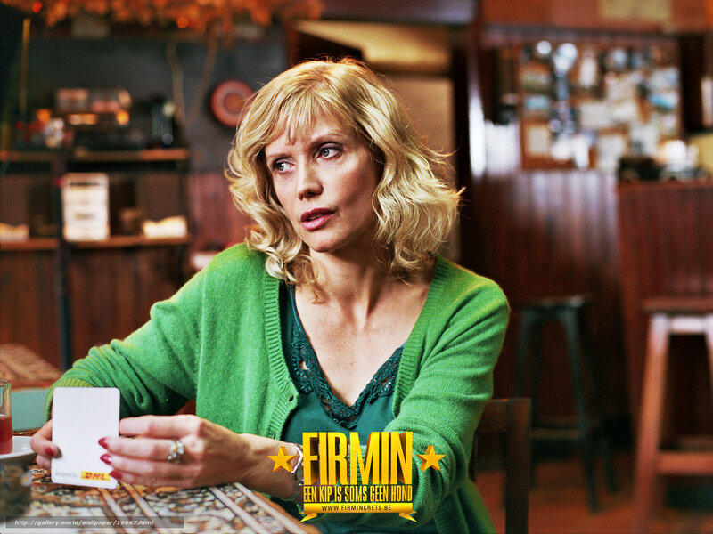 Woman in green sweater at cafe