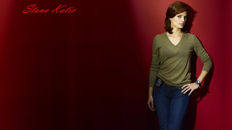 Woman in Green Sweater — Red, Confident, Photograph, Jeans