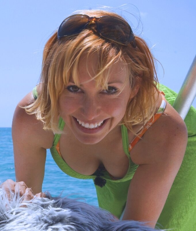 woman in green swimsuit smiling