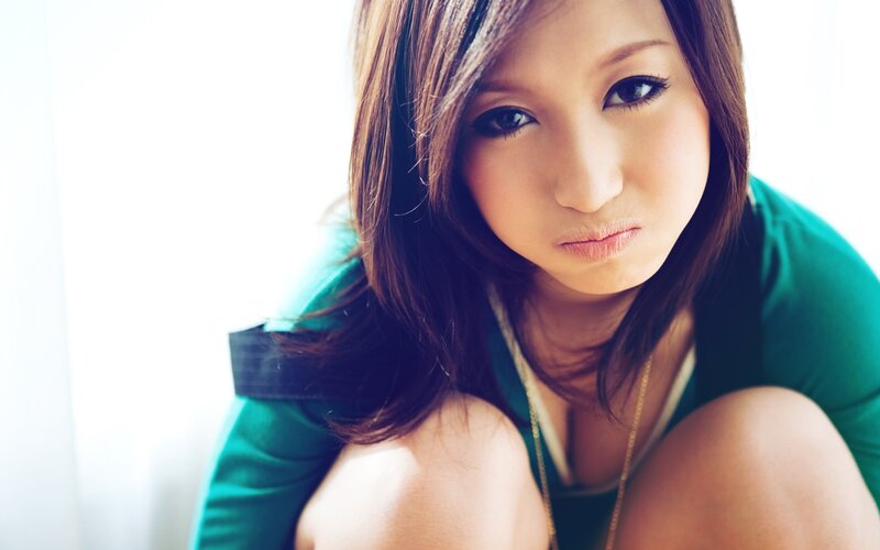 woman in green top