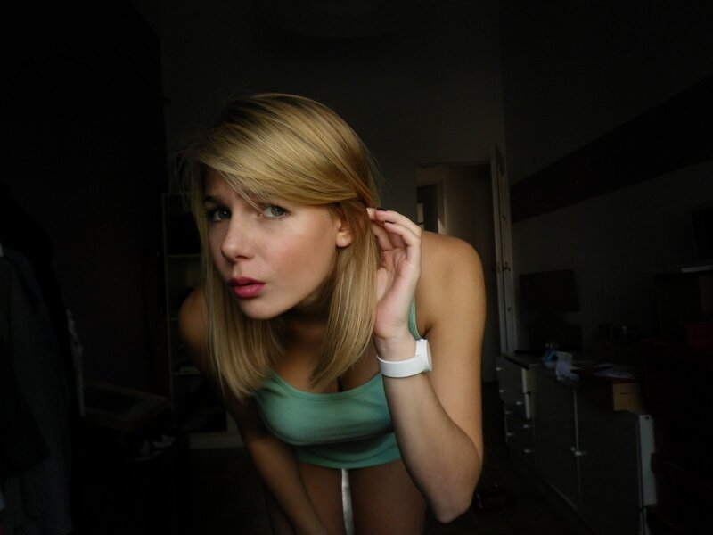 woman in green top indoors