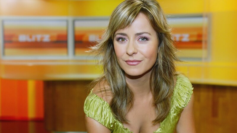 woman in green top on set
