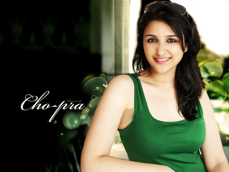 woman in green top smiling