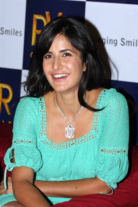 Woman in Green Top — Smiling, Photograph, Necklace