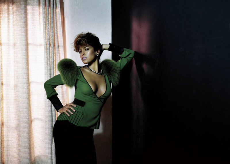 woman in green top with fur