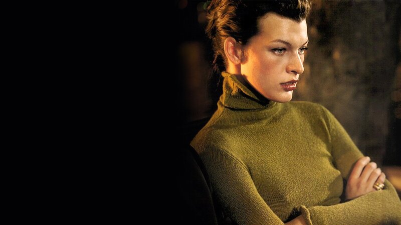 woman in green turtleneck