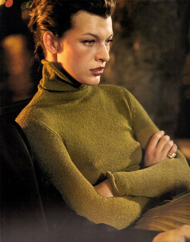 woman in green turtleneck