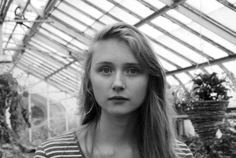 woman in greenhouse