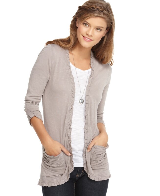 woman in grey cardigan
