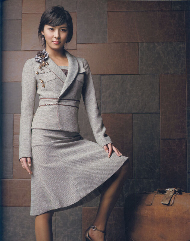 woman in grey suit