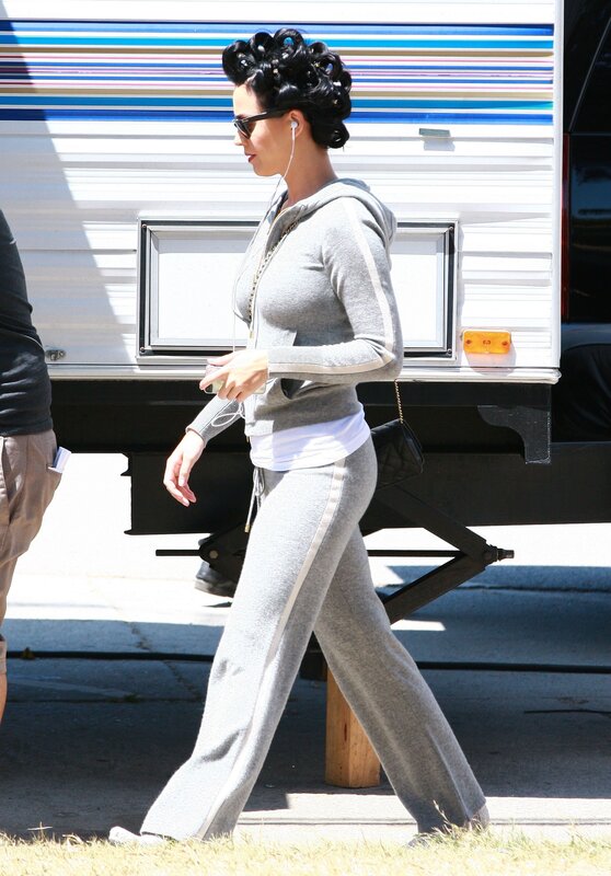 woman in grey tracksuit walking