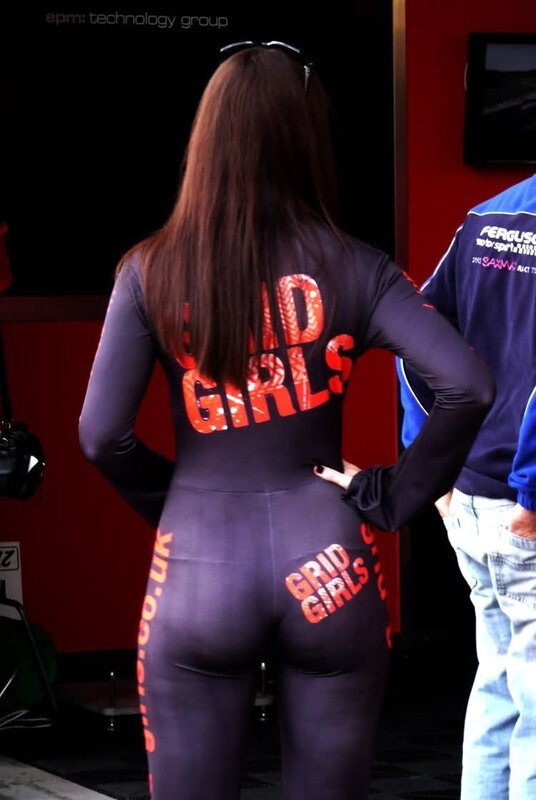 Woman in grid girls suit