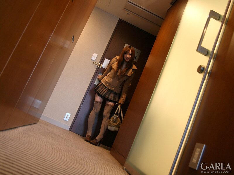 woman in hallway with bag