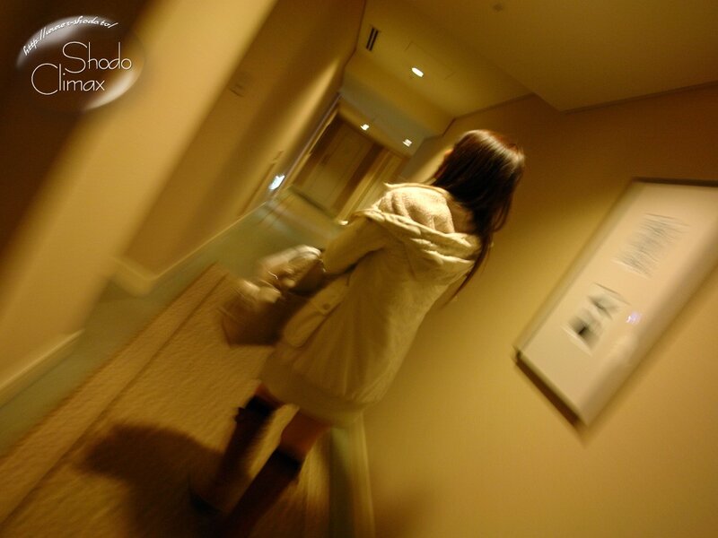 woman in hallway with coat