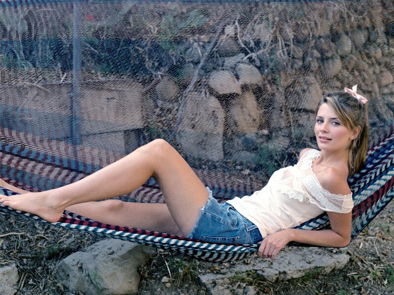 Woman in hammock outdoors