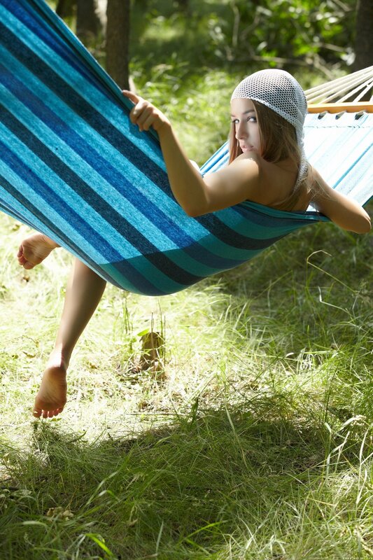 Woman in hammock outdoors