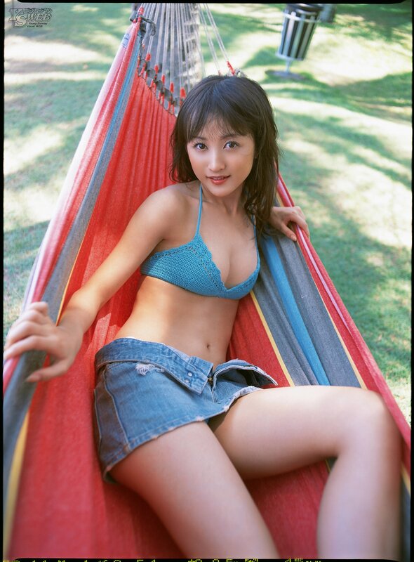 Woman in hammock wearing bikini top