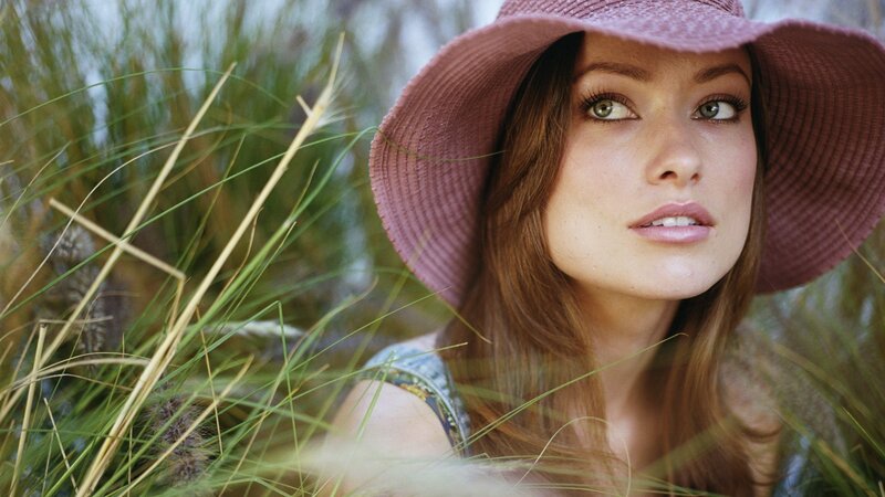 Woman in Hat Among Grass — Pink