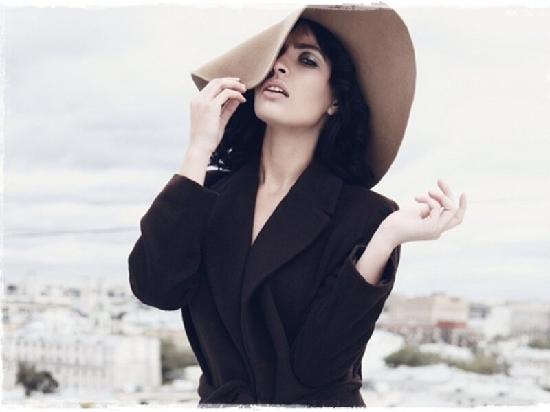 woman in hat and coat