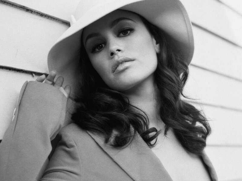 woman in hat and coat