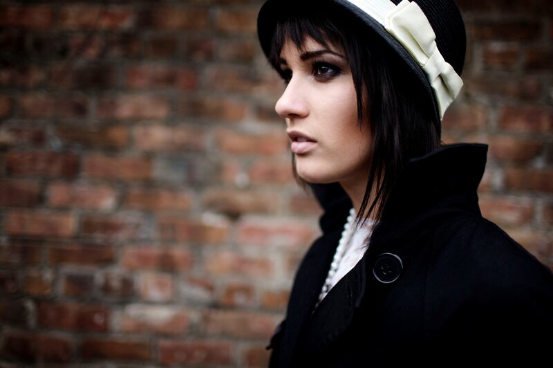 woman in hat and coat