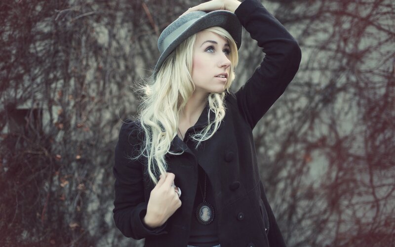 woman in hat and coat