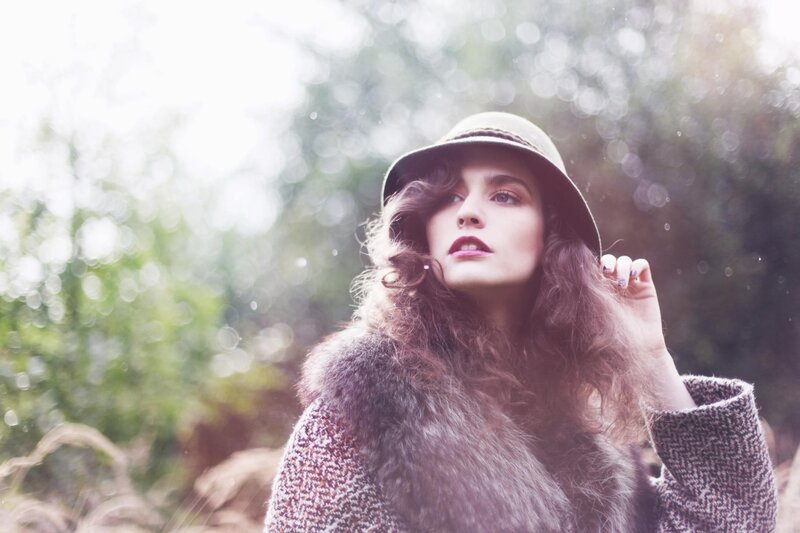 woman in hat and coat