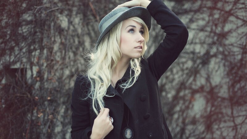 woman in hat and coat