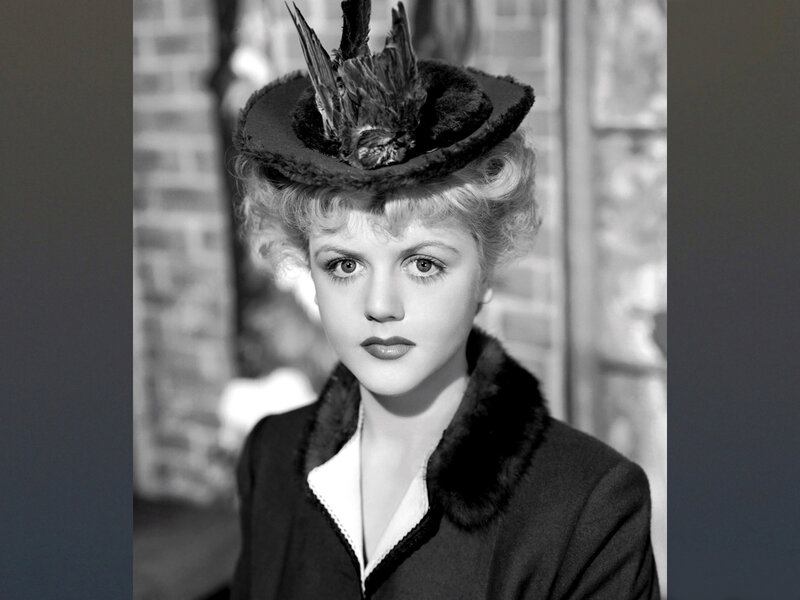 Woman in Hat and Coat — Black, Serious