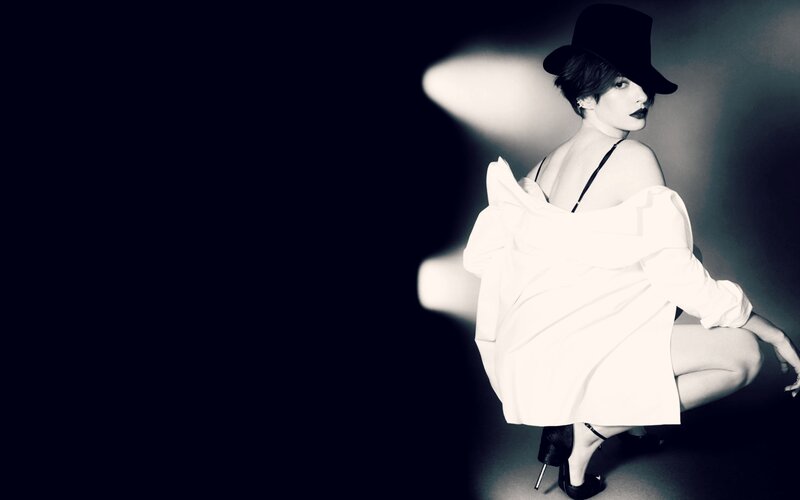 Woman in Hat and Dress — Black, Dramatic