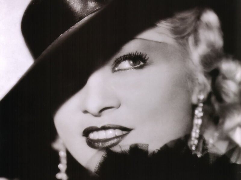 Woman in Hat and Earrings — Black