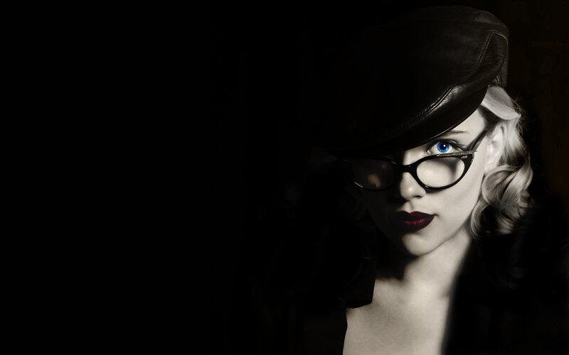 woman in hat and glasses
