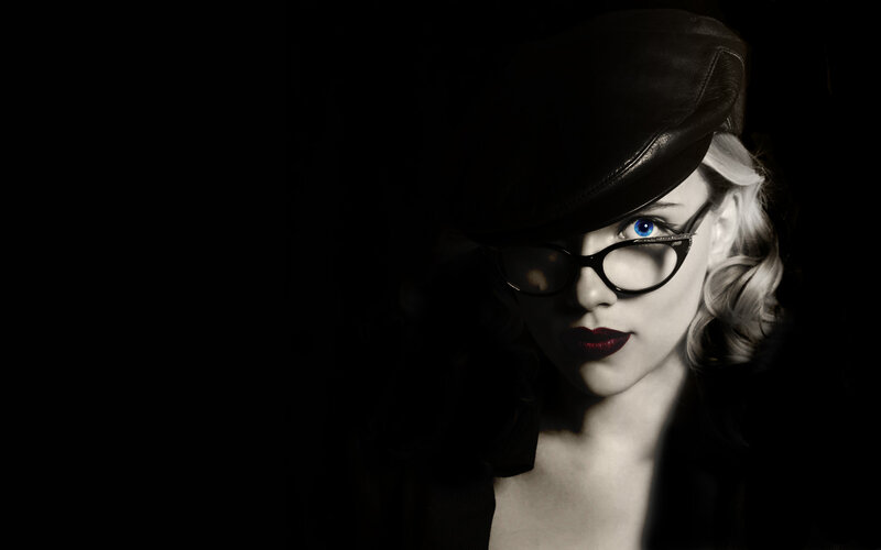 woman in hat and glasses