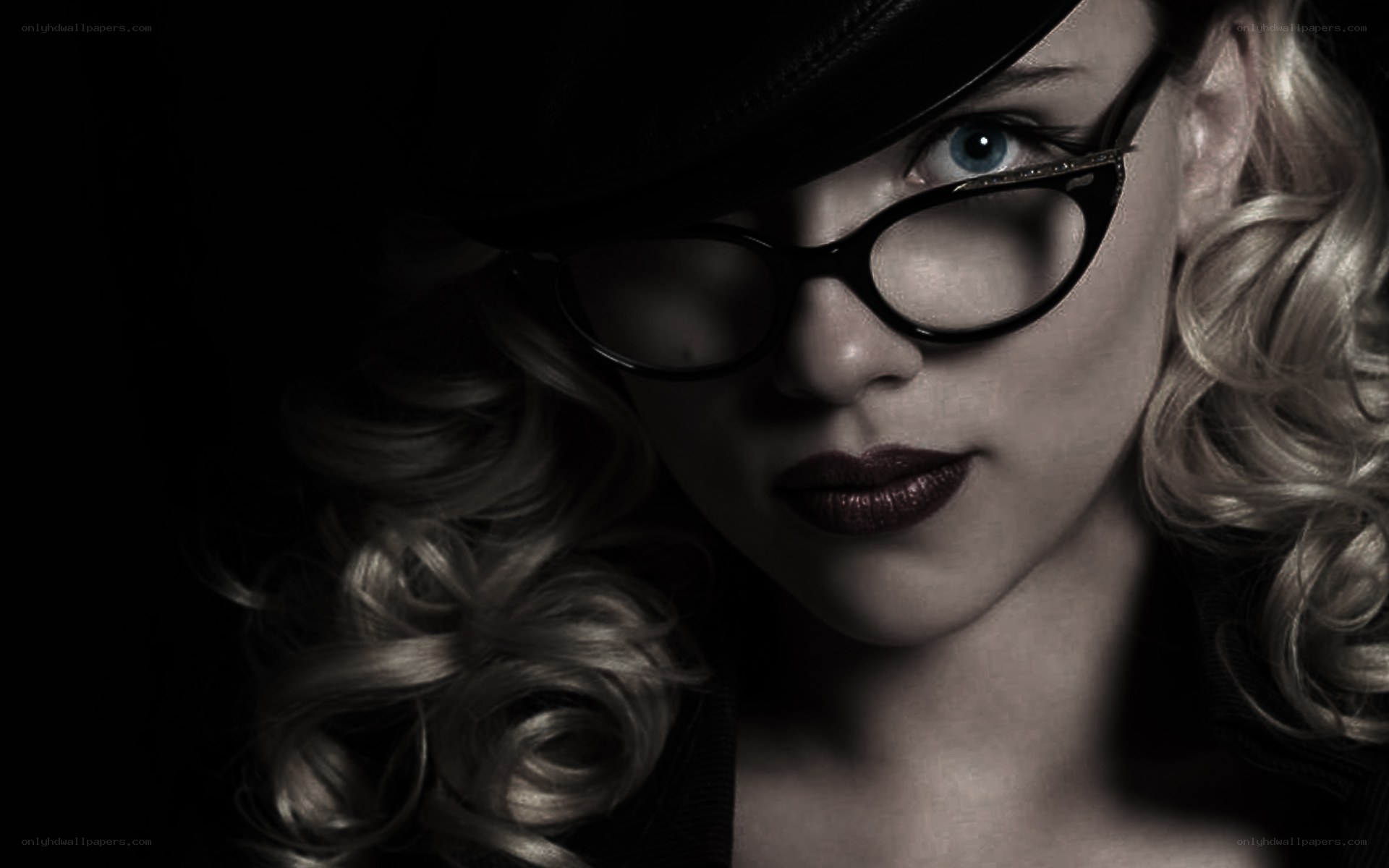 woman in hat and glasses