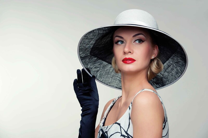 Woman in Hat and Gloves — White, Dramatic