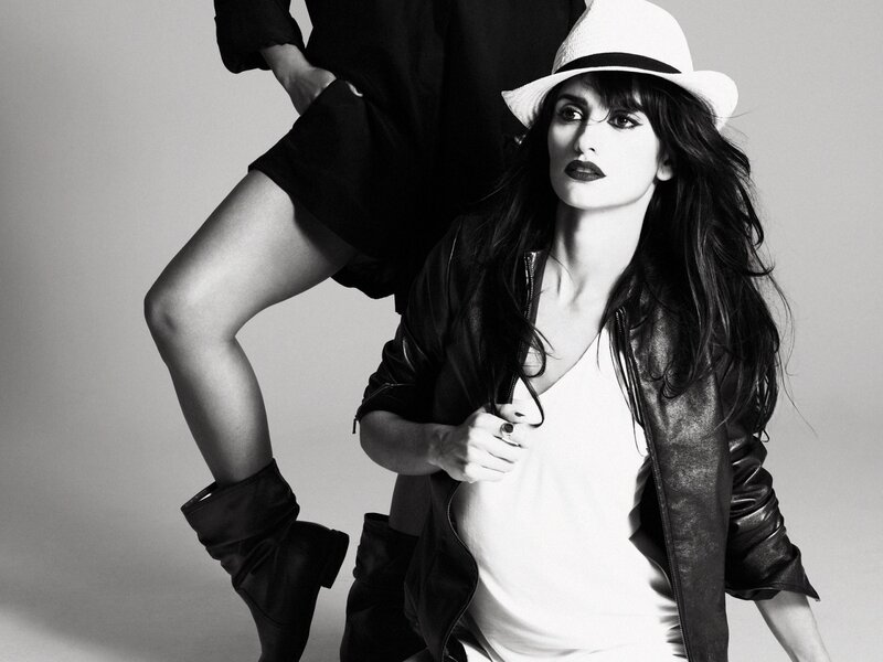 woman in hat and leather jacket